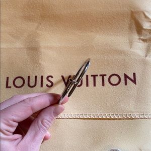 Silver color nail bracelet.